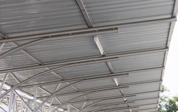 installing Quaking Houses metal roofing